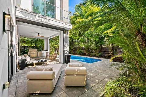 a view of a house with a garden