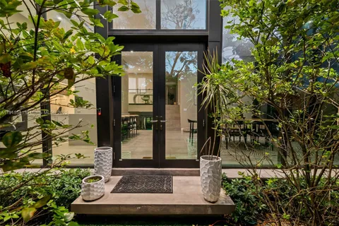 a view of a bird door of the house