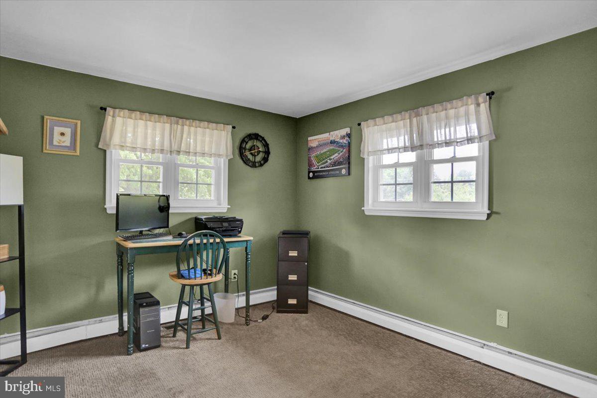692 Brownsville Road Reading, PA 19608 - Photo 14 of 43 a view of a livingroom with furniture and windows