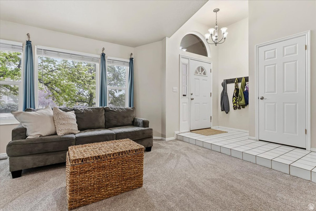 7975 Showcase Lane Sandy, UT 84094 - Photo 5 of 29 Bright open living room with vaulted ceiling
