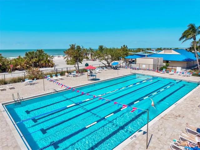 a outdoor space with lots of tables and chairs