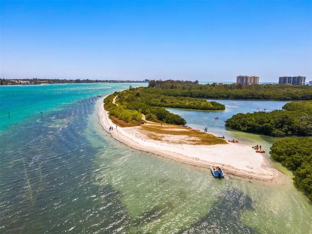 a view of lake and city with ocean view