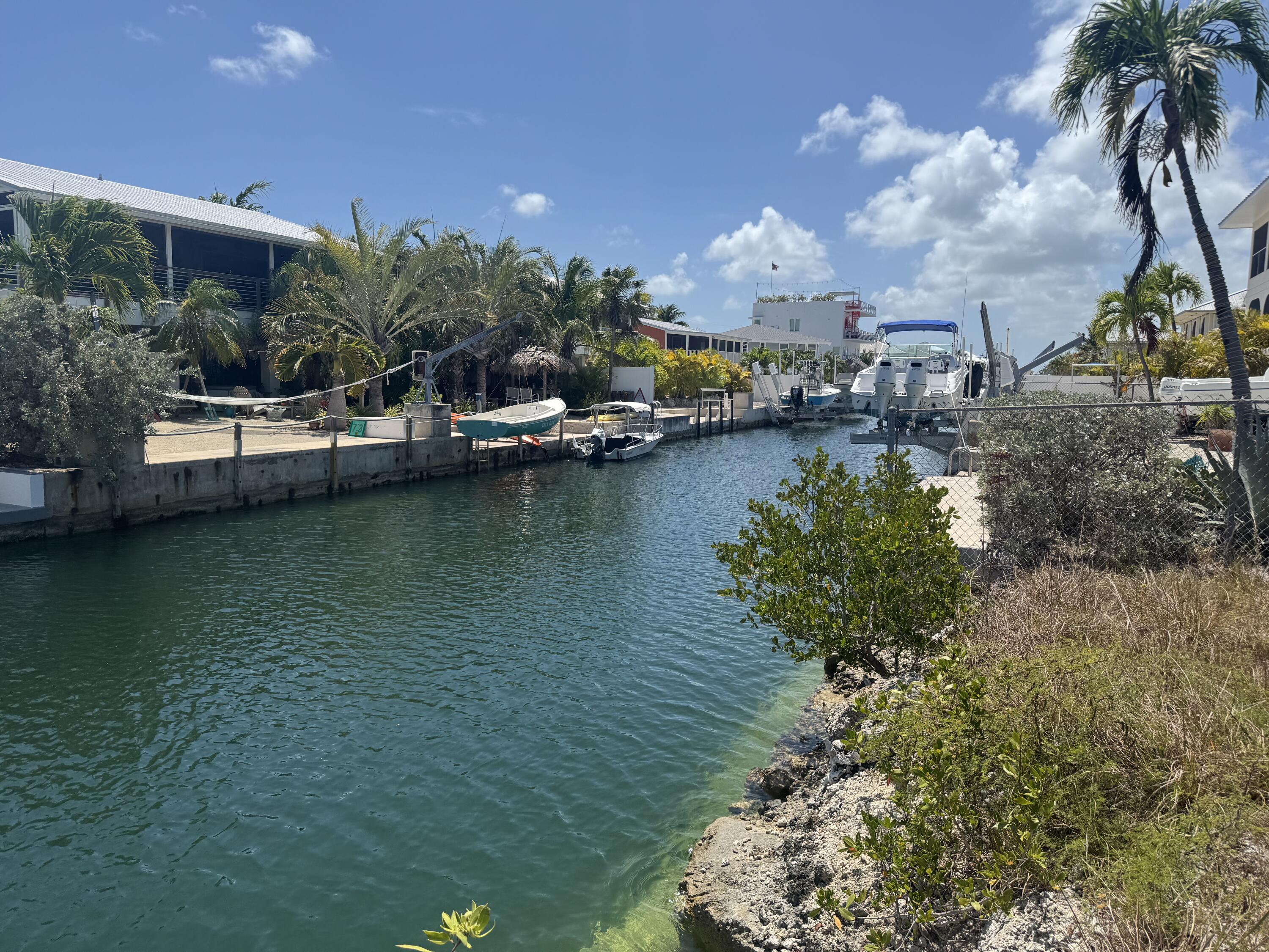 29558 Ranger Avenue Big Pine Key, FL 33043 - Photo 10 of 19 a view of a lake with houses