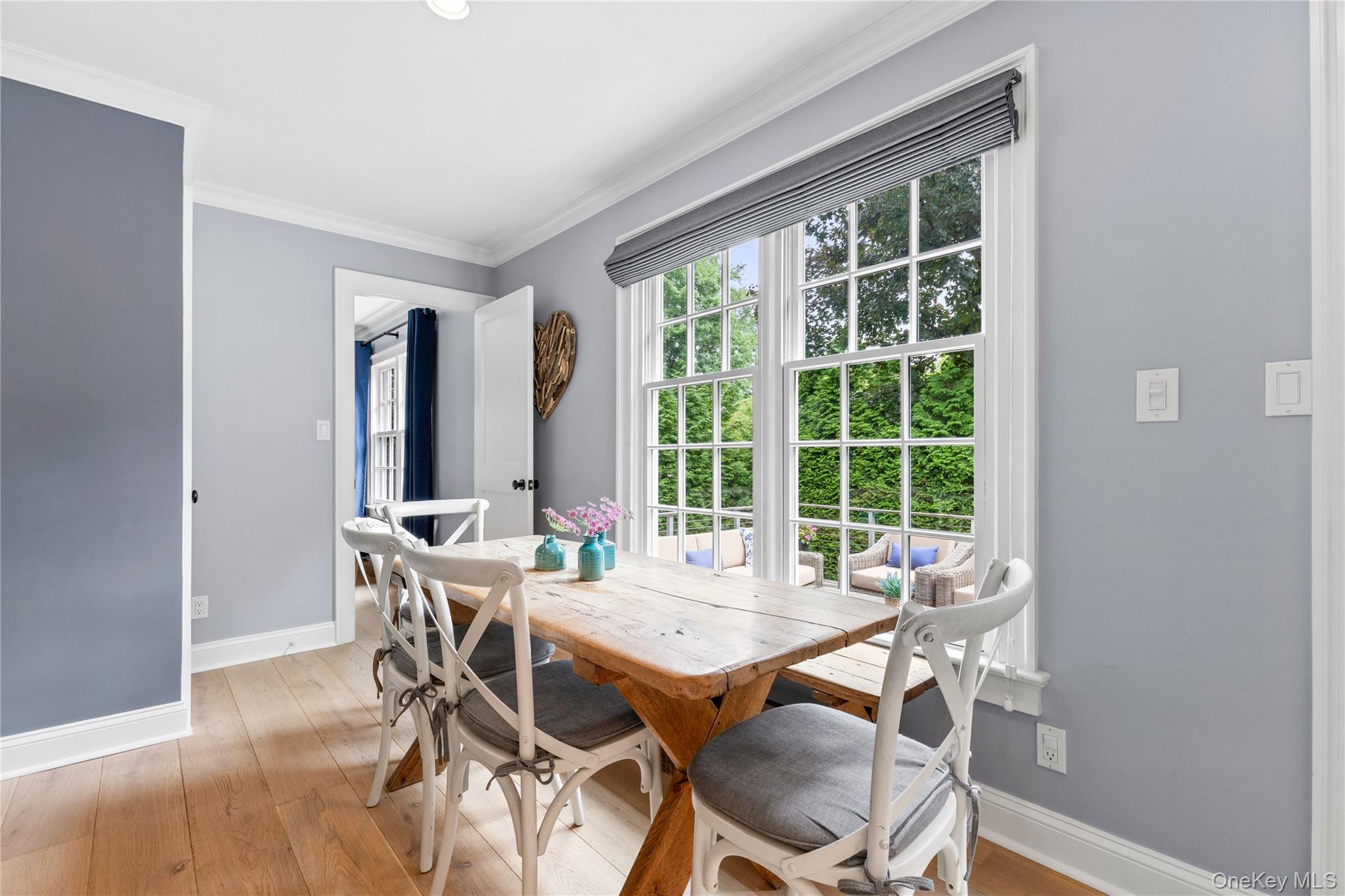 394 Park Avenue Rye, NY 10580 - Photo 11 of 36 Additional room for a dining table with large window view of the backyard