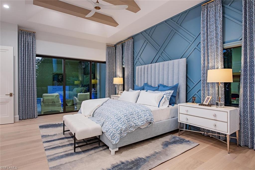 655 Parkview Lane Naples, FL 34103 - Photo 16 of 37 a bedroom with a bed and a window