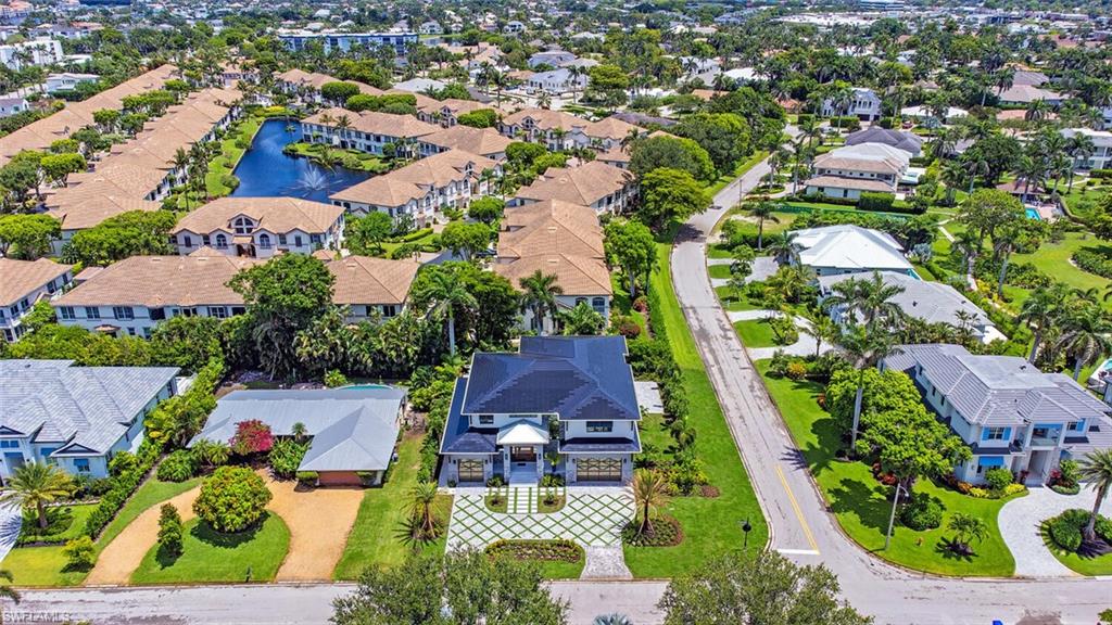 655 Parkview Lane Naples, FL 34103 - Photo 36 of 37 an aerial view of residential houses with outdoor space and street view