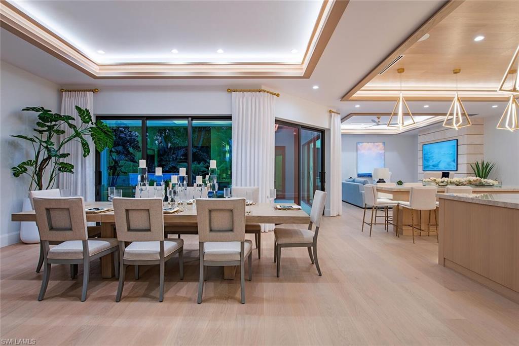 655 Parkview Lane Naples, FL 34103 - Photo 6 of 37 a view of a dining room with furniture window and outside view