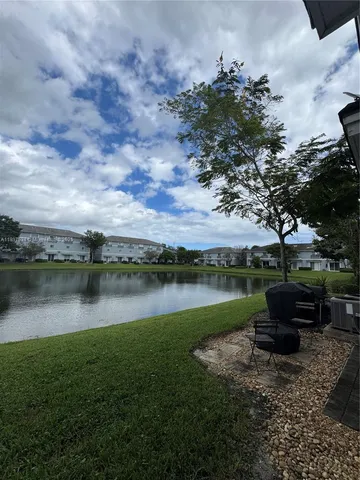 a lake view with a garden