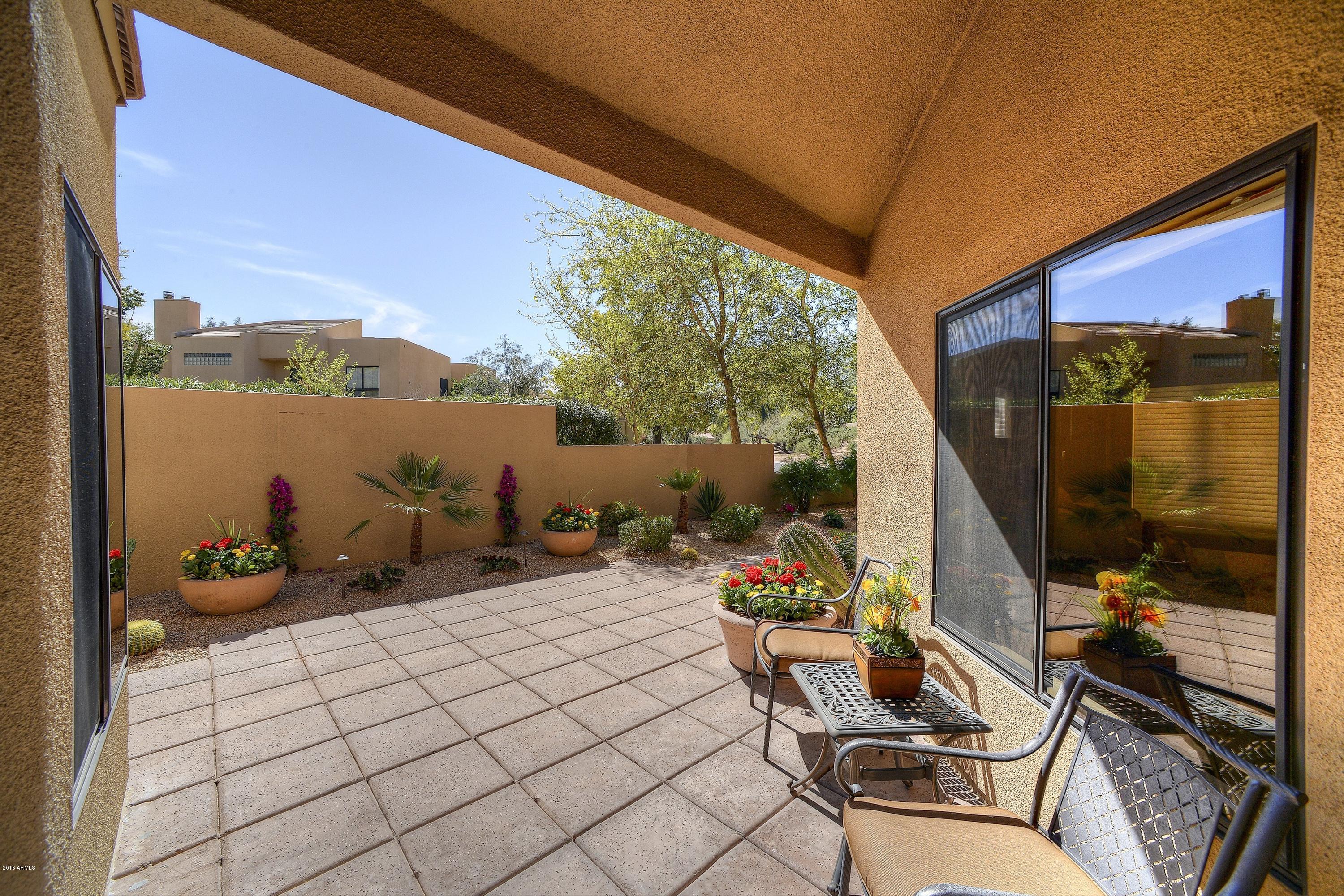 7740 East Gainey Ranch Road, Unit 58 Scottsdale, AZ 85258 - Photo 19 of 27 a outdoor space with furniture