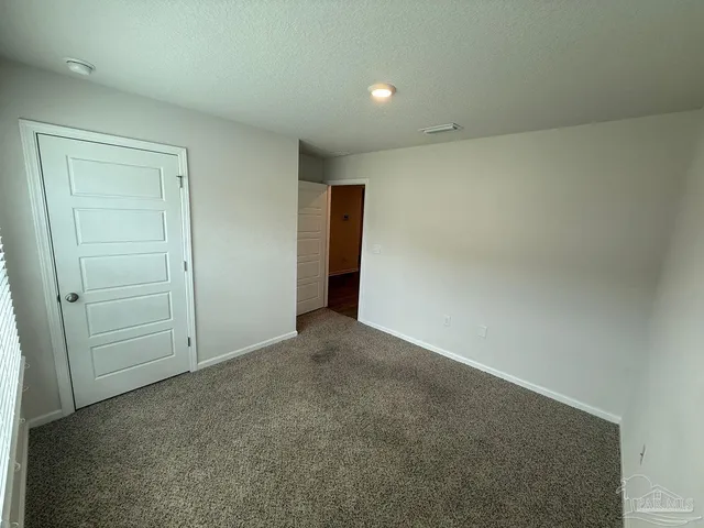 an empty room with an entryway