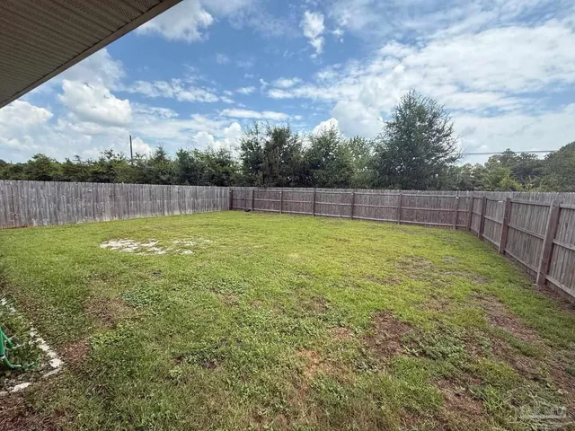 a view of a bathtub in a yard