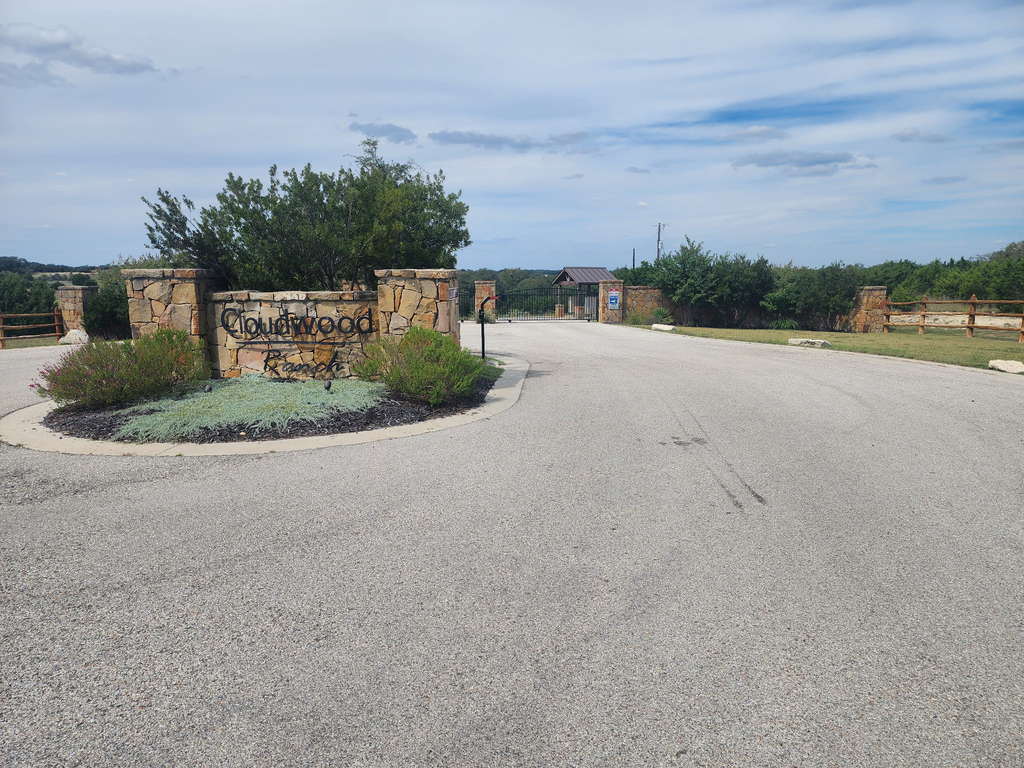 a view of a street with a houses