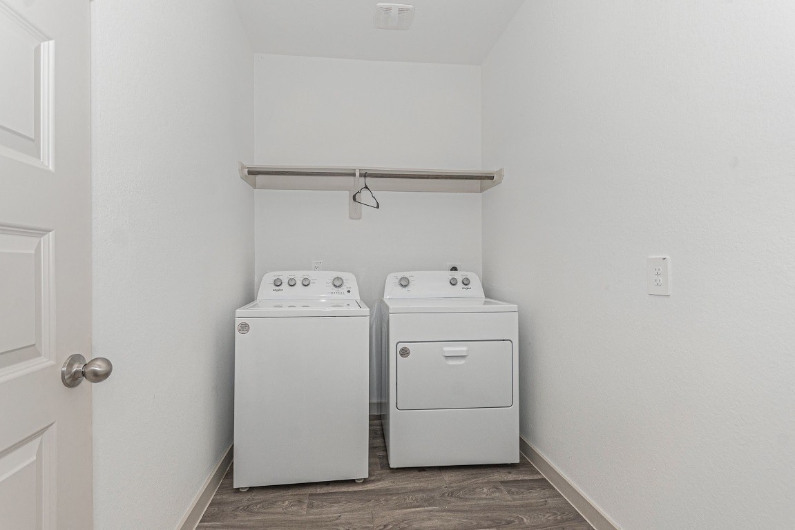 31 Desert Spring Lane Manvel, TX 77578 - Photo 6 of 10 a utility room with dryer and washer