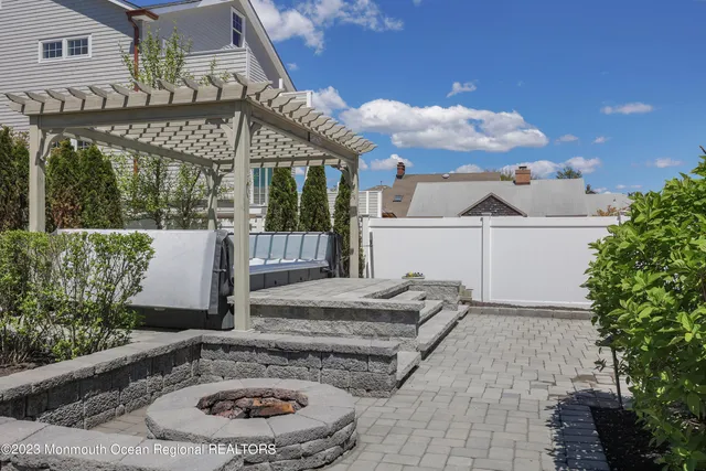 a view of swimming pool with a patio