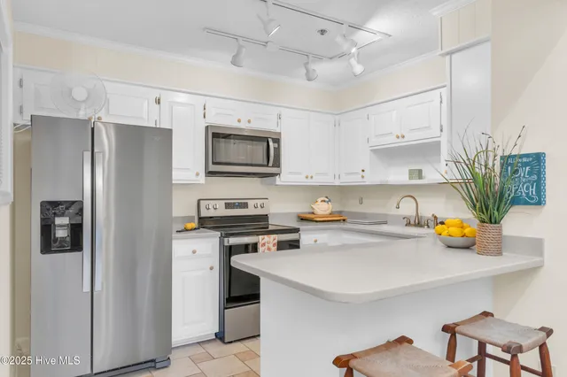 $439,900 | 1896 New River Inlet Road, Unit 1402, North Topsail Beach, NC 28460