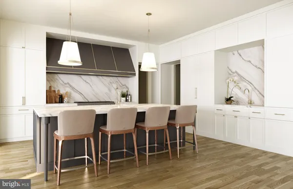 a dining room with wooden floor a chandelier a wooden table and chairs