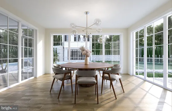 a dining room with furniture window and wooden floor
