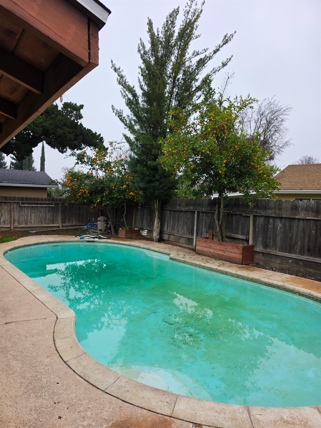 1624 Falmouth Way Modesto, CA 95355 - Photo 22 of 26 a view of a backyard with a small cabin
