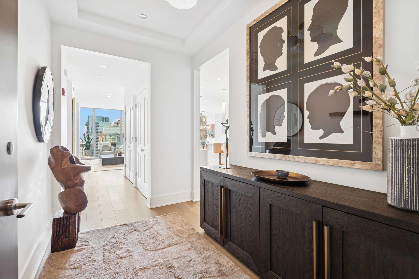 363 East Wacker Drive, Unit 2606 Chicago, IL 60601 - Photo 3 of 68 a view of living room with furniture and a fireplace