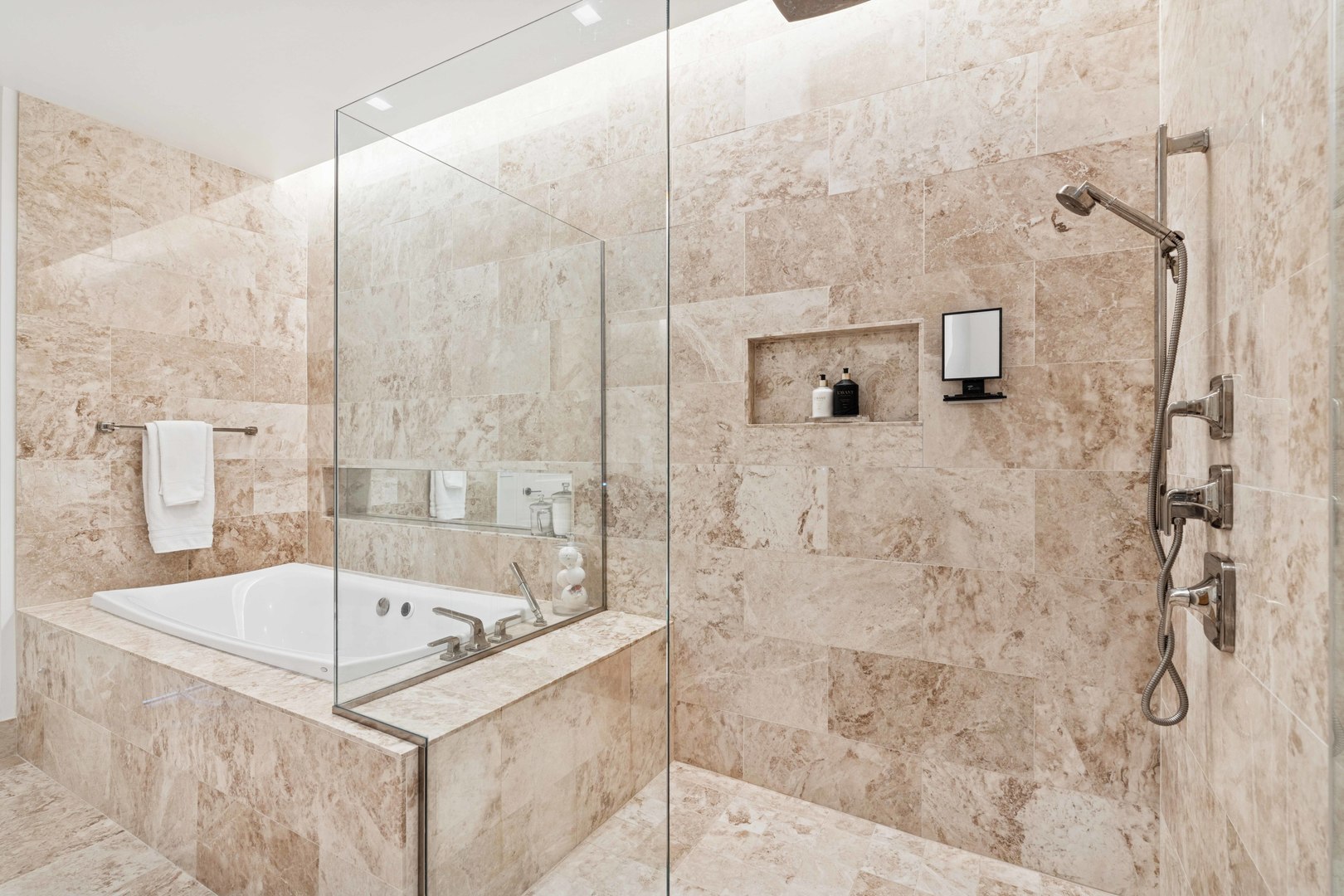 363 East Wacker Drive, Unit 2606 Chicago, IL 60601 - Photo 33 of 68 a bathroom with a bathtub and shower