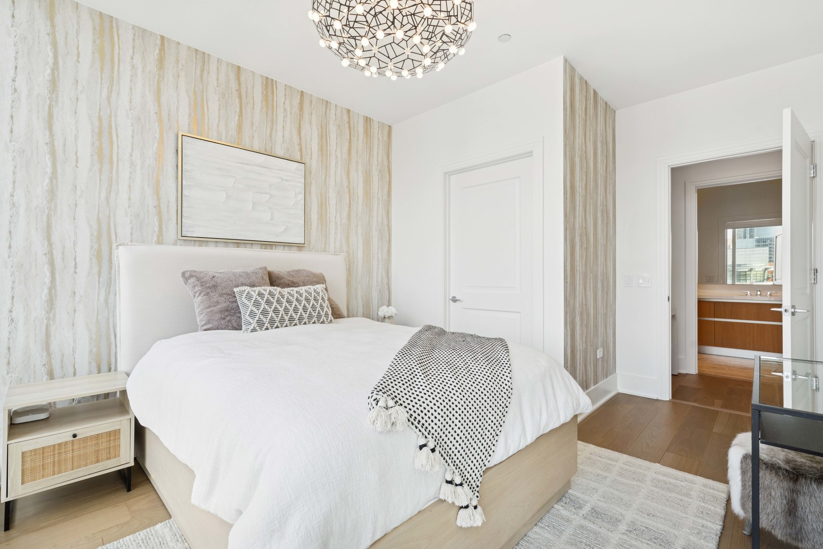 363 East Wacker Drive, Unit 2606 Chicago, IL 60601 - Photo 36 of 68 a bedroom with a bed and a view of bedroom