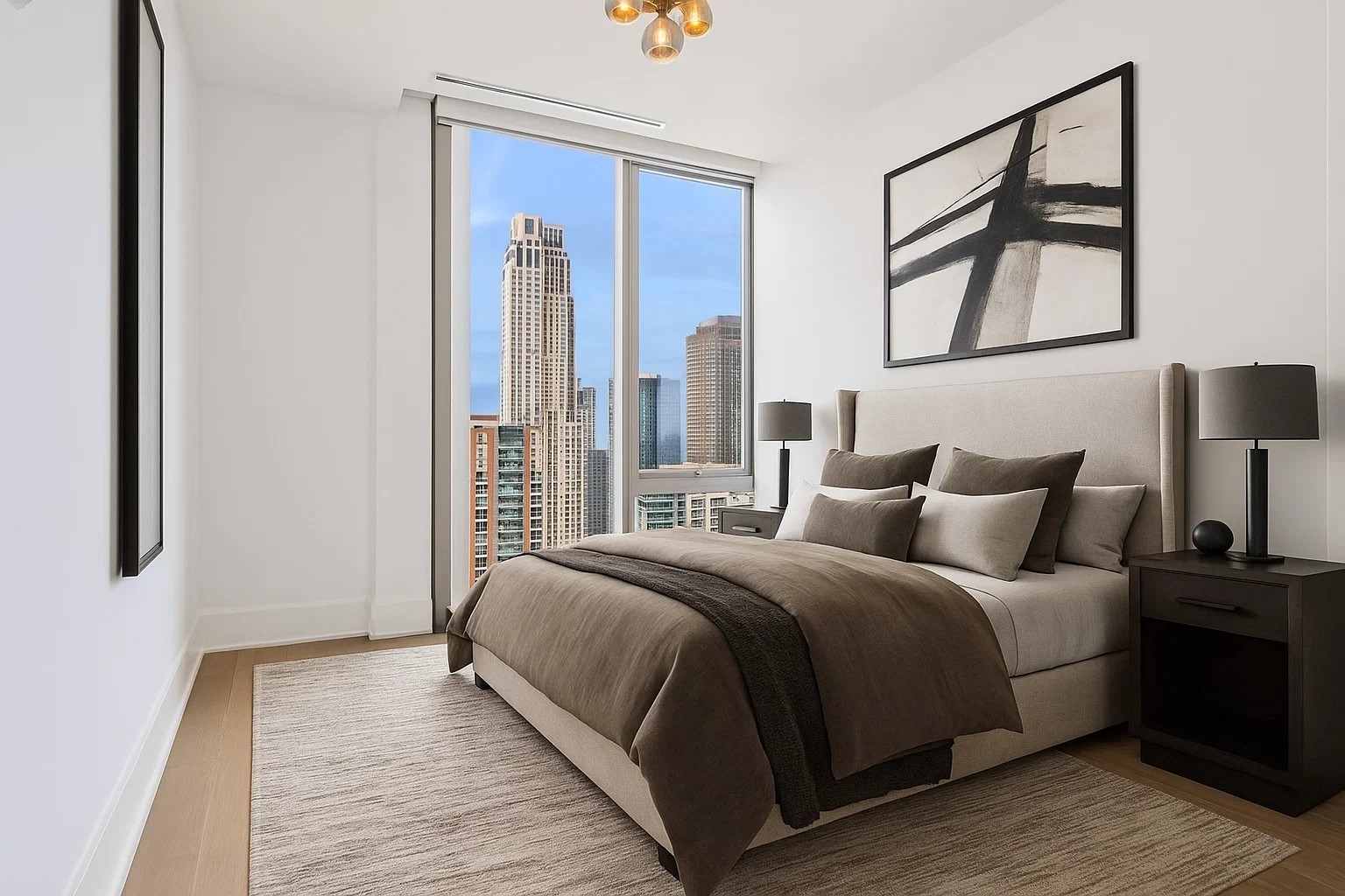 363 East Wacker Drive, Unit 2606 Chicago, IL 60601 - Photo 38 of 68 a bedroom with a large bed and a night stand
