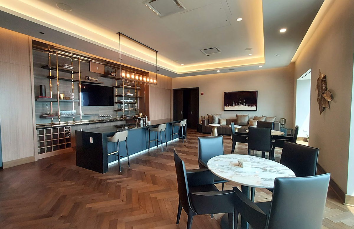 363 East Wacker Drive, Unit 2606 Chicago, IL 60601 - Photo 64 of 68 a large kitchen with a table and chairs