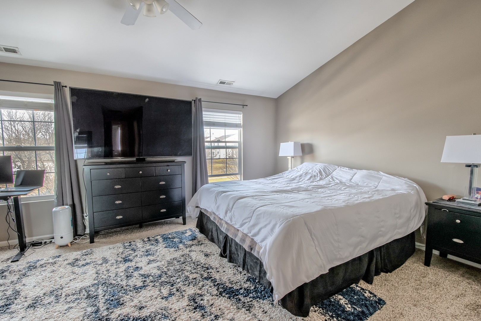 2305 Summerlin Drive Aurora, IL 60503 - Photo 12 of 22 a bedroom with a bed and a dresser