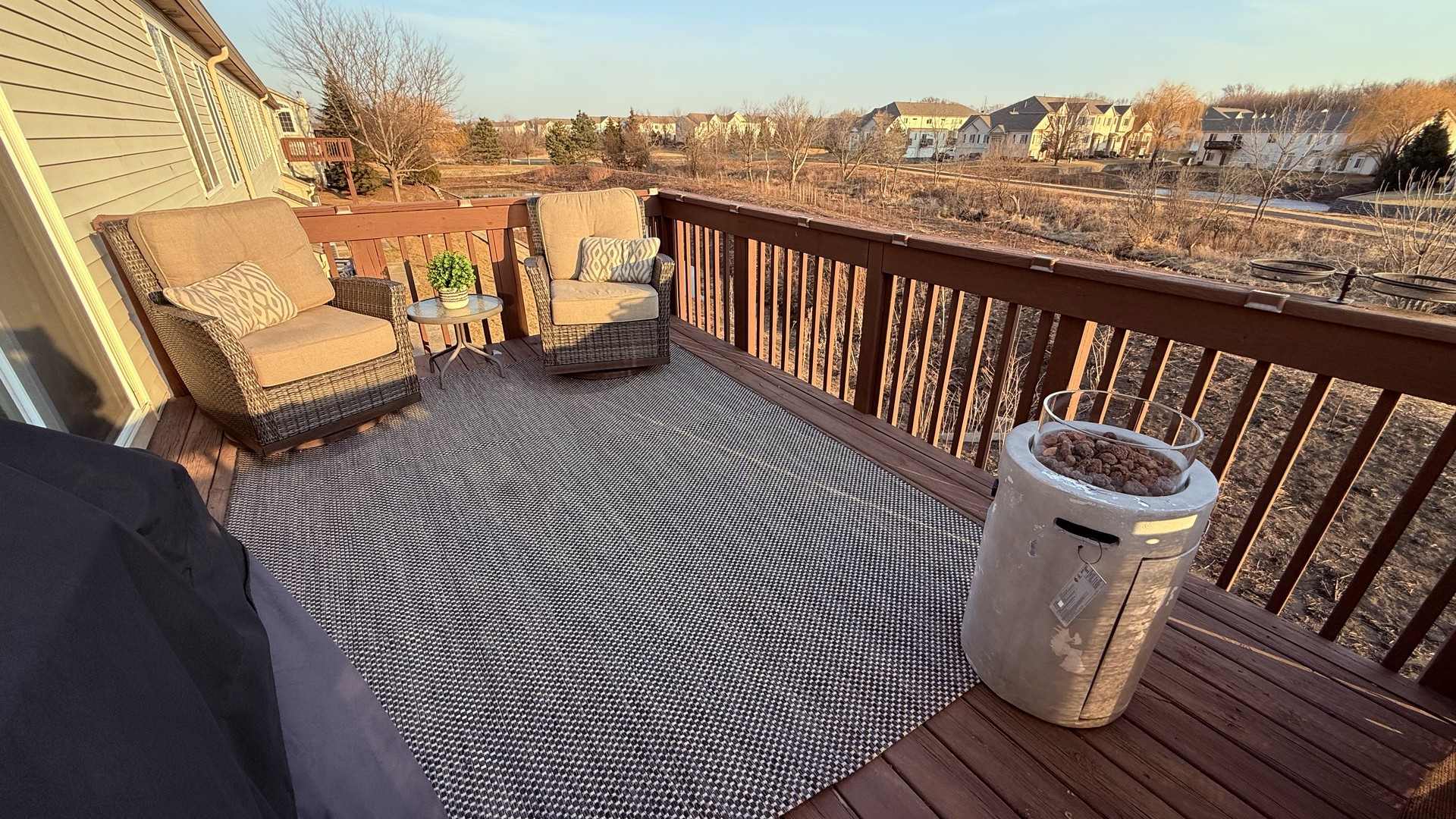 2305 Summerlin Drive Aurora, IL 60503 - Photo 16 of 22 a view of a balcony with wooden floor and iron fence