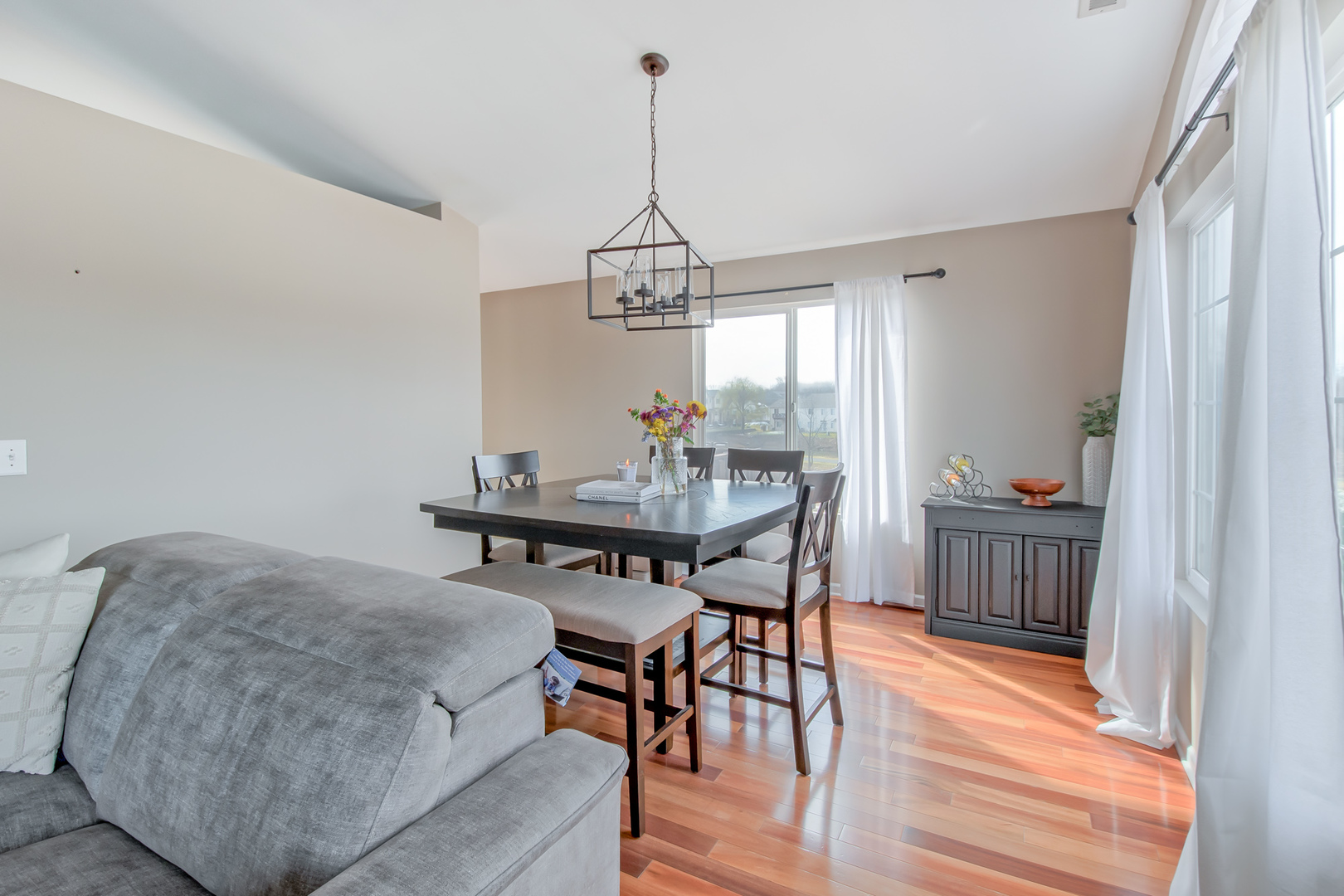 2305 Summerlin Drive Aurora, IL 60503 - Photo 6 of 22 a view of a dining room with furniture window and wooden floor