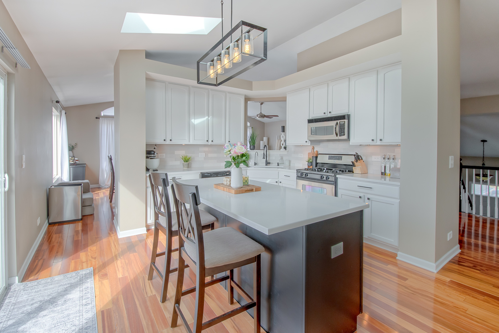 2305 Summerlin Drive Aurora, IL 60503 - Photo 9 of 22 a kitchen with a dining table chairs and refrigerator