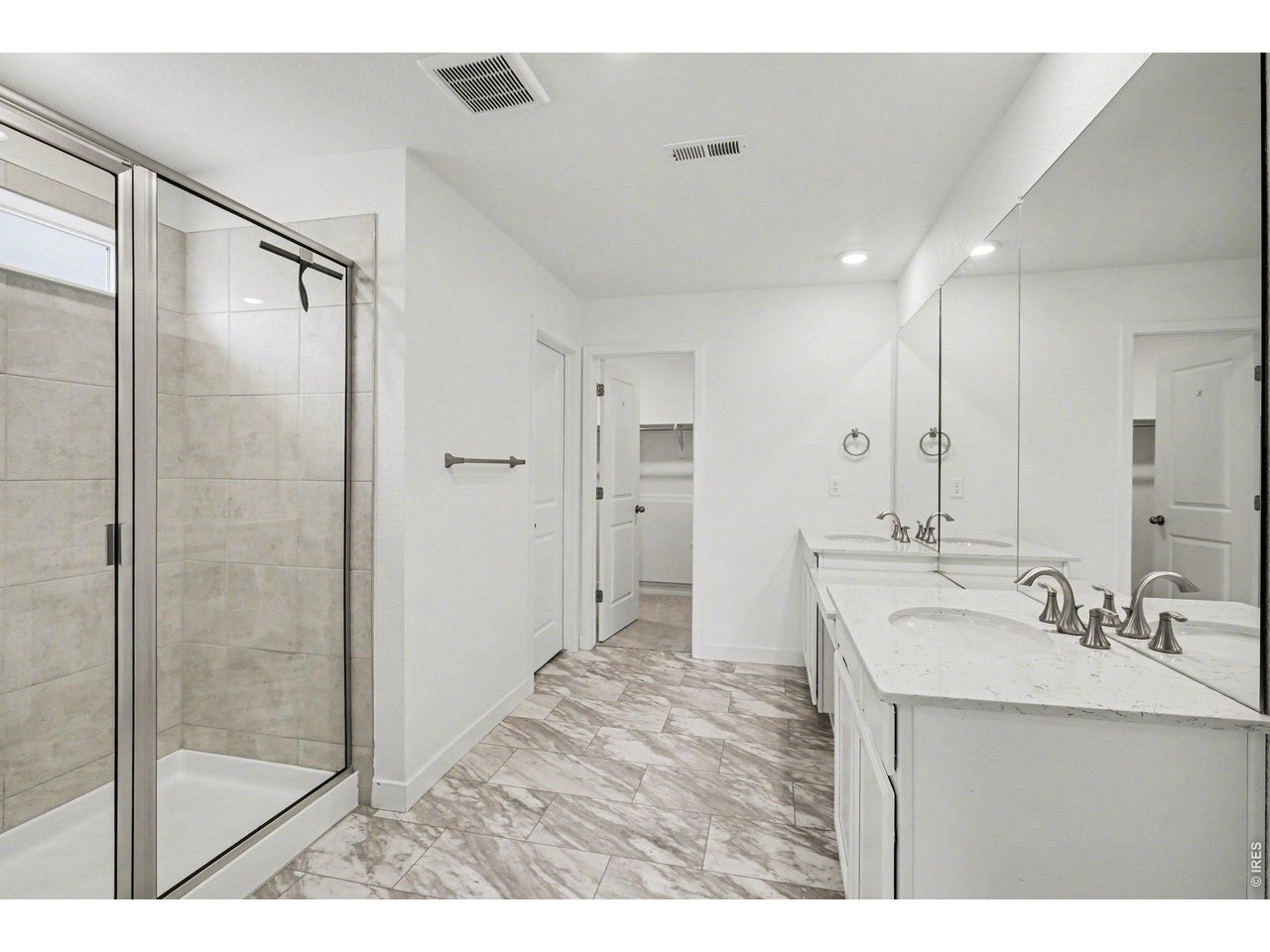 5258 Inland Avenue Firestone, CO 80504 - Photo 24 of 44 Primary Bath w/ Walk-In Shower
