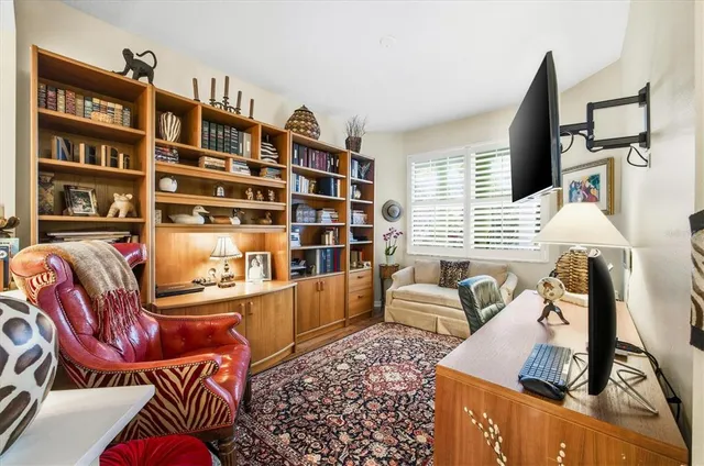 a living room with a couch and a flat screen tv