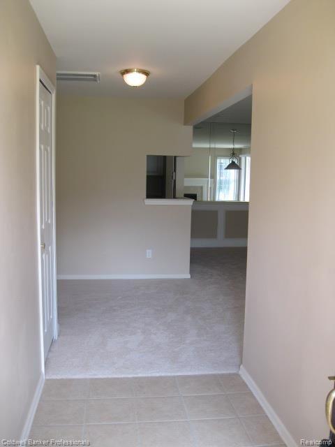 From Front Door into Expansive Entry-all new carpet throughout