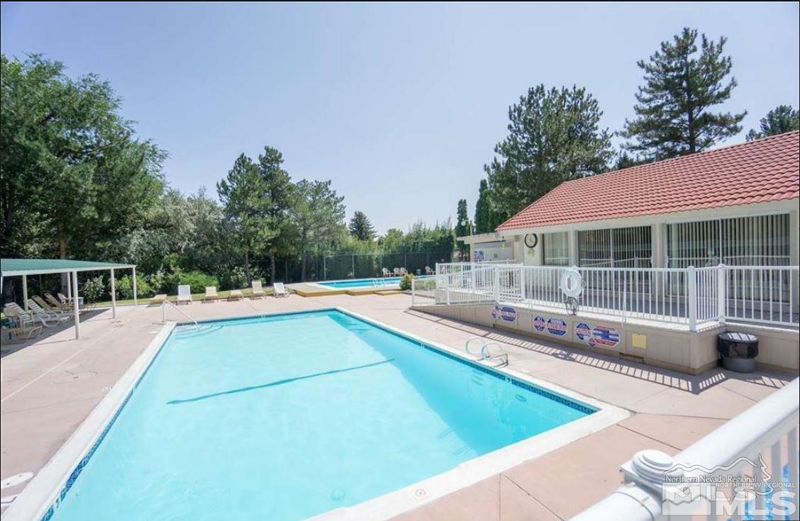 1230 Conway Lane Reno, NV 89503 - Photo 23 of 24 a view of a house with swimming pool and sitting area
