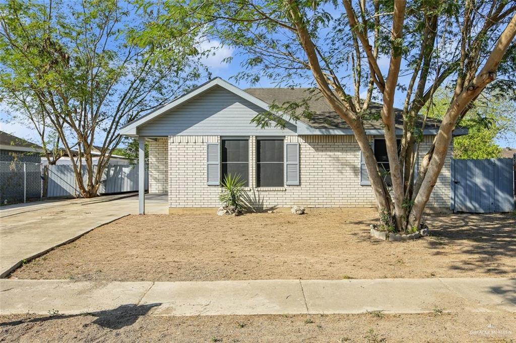 802 West Cardinal Avenue Pharr, TX 78577 - Photo 1 of 1 a front view of a house with a yard