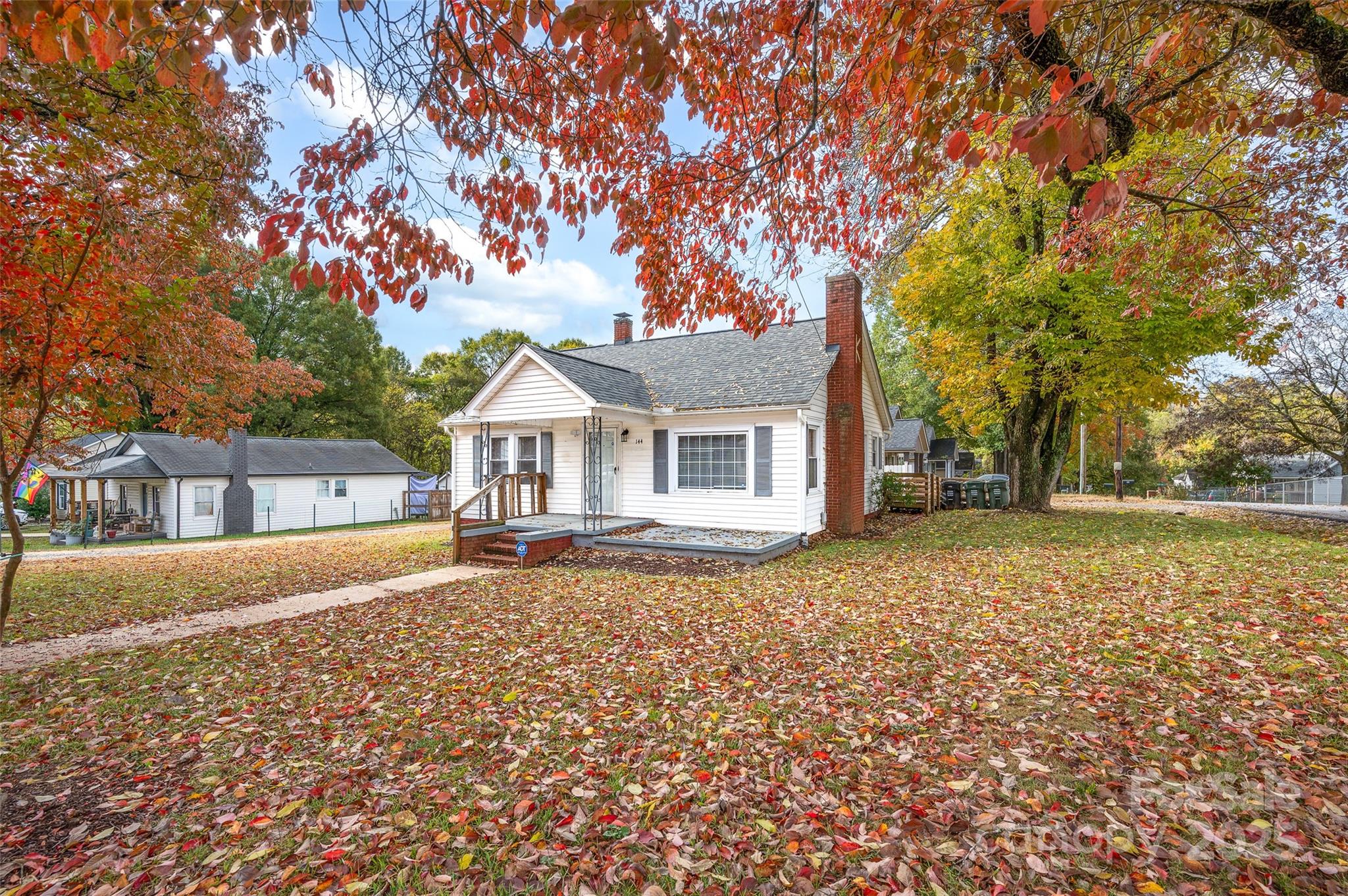 144 Robbins Street Southwest Concord, NC 28025 - Photo 3 of 29 a front view of a house with garden