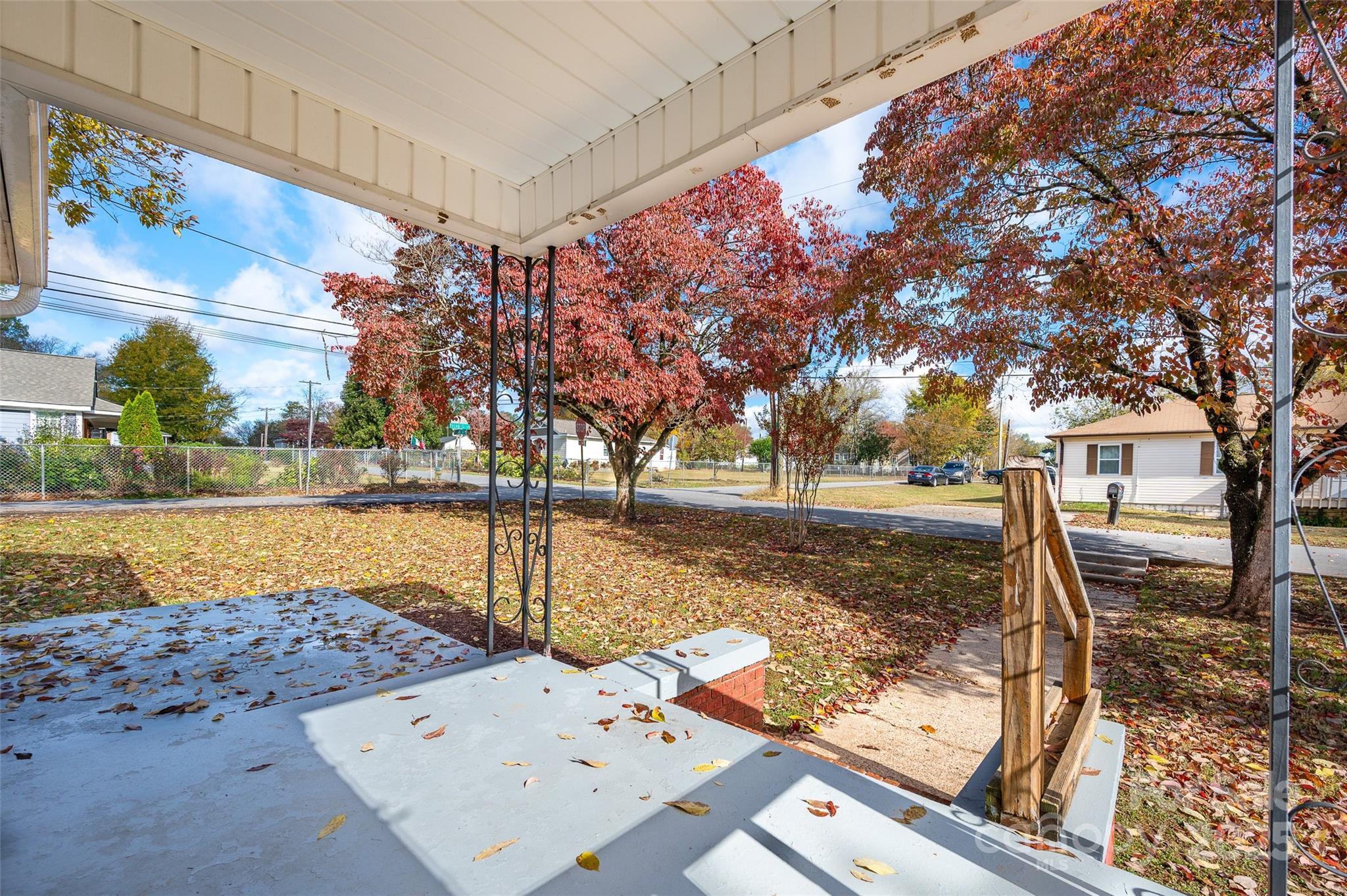 144 Robbins Street Southwest Concord, NC 28025 - Photo 5 of 29 a view of a yard with trees in the background