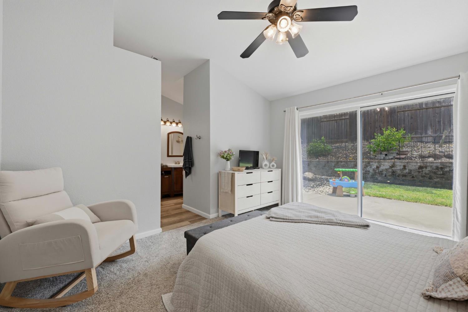5013 Charter Road Rocklin, CA 95765 - Photo 17 of 35 a bedroom with furniture and a window