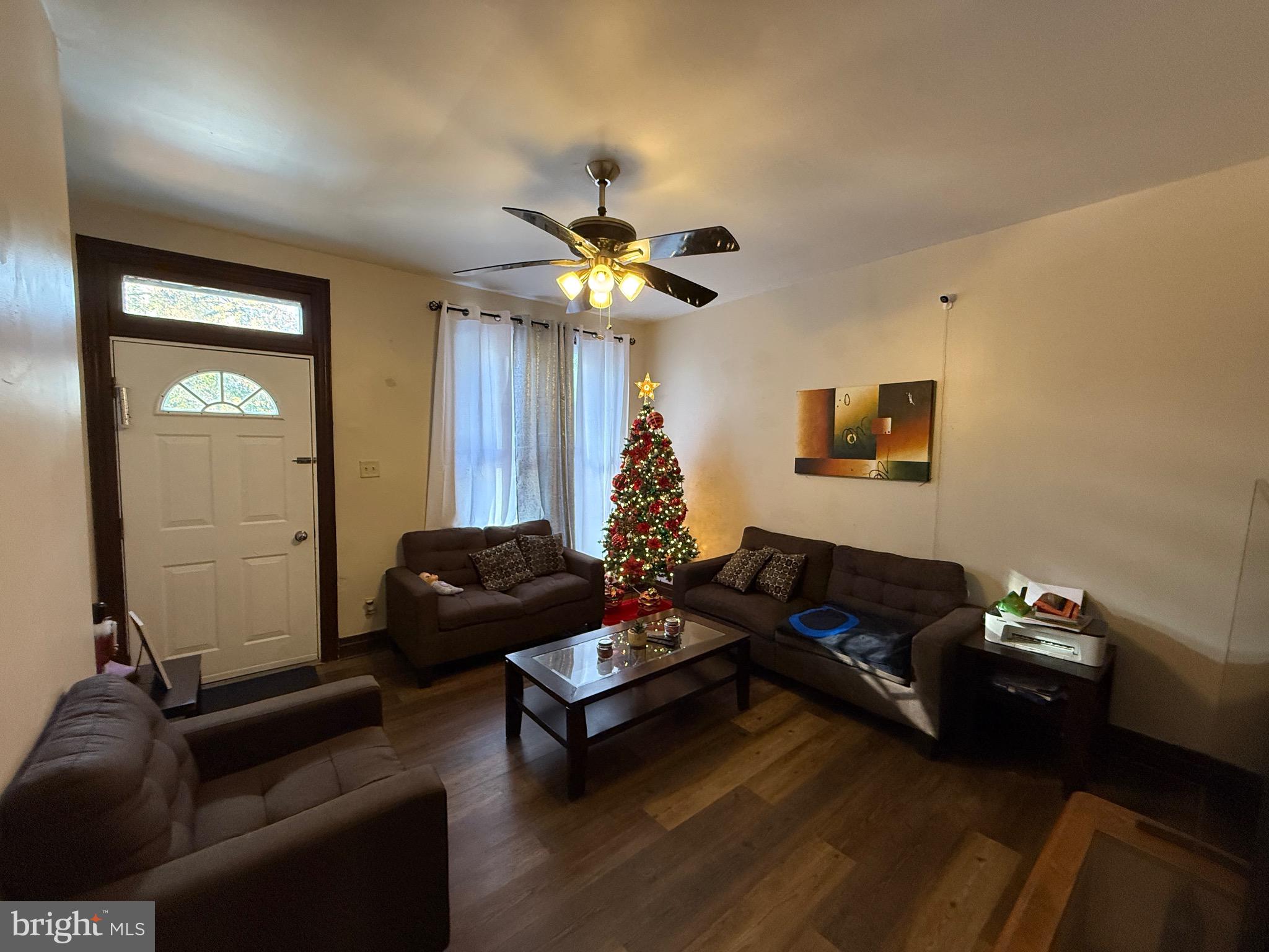 930 Spring Street Lebanon, PA 17046 - Photo 4 of 13 a living room with furniture and a chandelier