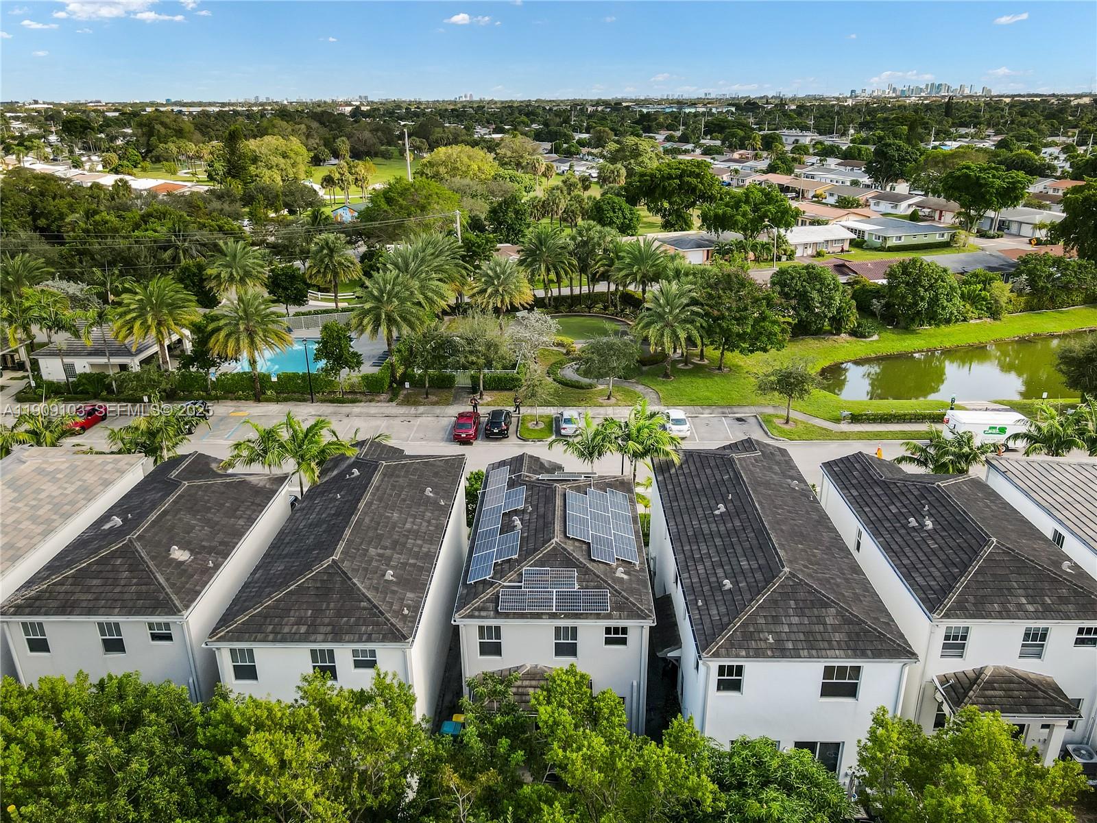 4445 Northwest 48th Terrace Tamarac, FL 33319 - Photo 3 of 19 an aerial view of multiple house
