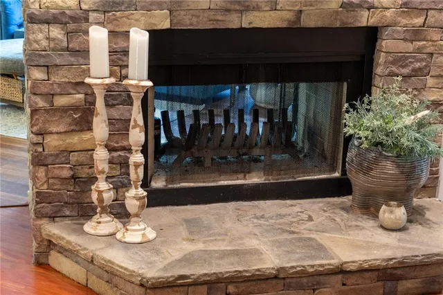 a bedroom with a bed and flat screen tv