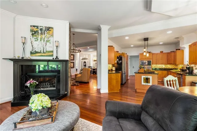a view of backyard with plants and outdoor seating