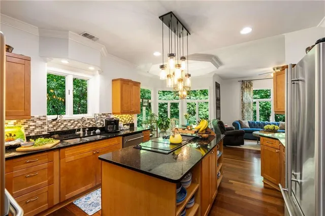 a view of a dining room with furniture window and outside view