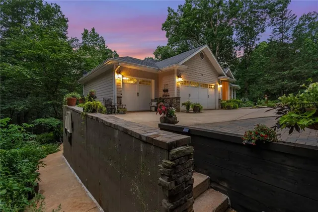 front view of a house with a garden
