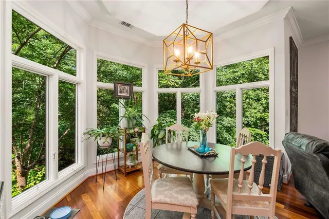 a view of swimming pool with chairs