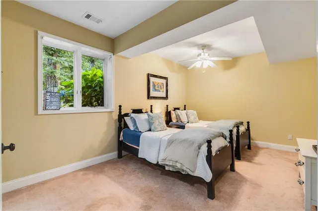a view of a chairs and table on the wooden floor