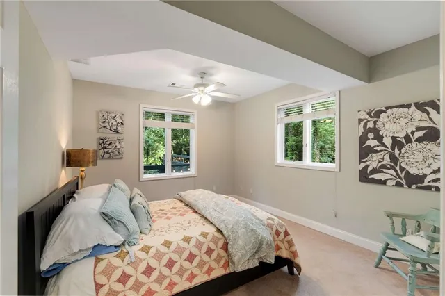 a view of house with swimming pool outdoor seating