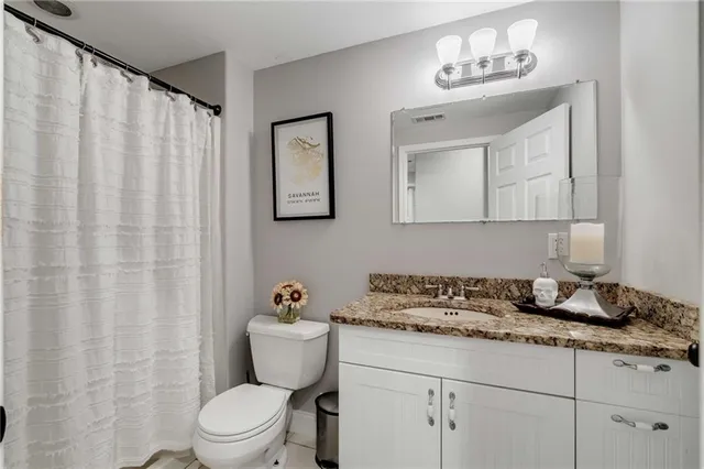 a view of a sitting area with furniture and garden