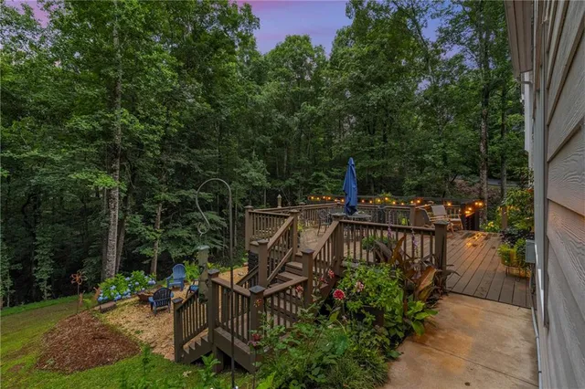 a view of a chairs and table in the yard
